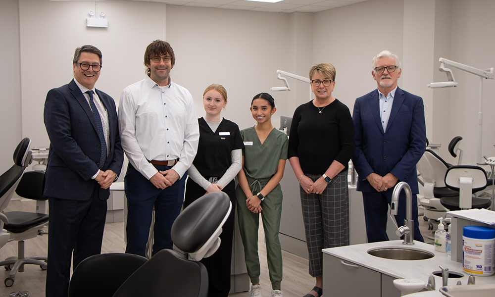 Cutline: (L-R) Dr. Mike Connolly, CEO, Dental Association of PEI, Dr. Matt Gilchrist, President, Dental Association of PEI, Anika Oakes, Dental Assisting student, Nicole Reyes, Dental Assisting student, Wanda MacInnis, Learning Manager, Dental Assisting program, Dr. Sandy MacDonald, President & CEO, Holland College 