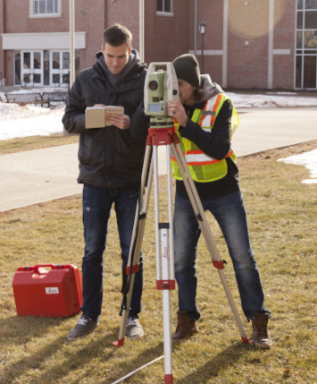 Students surveying on campus